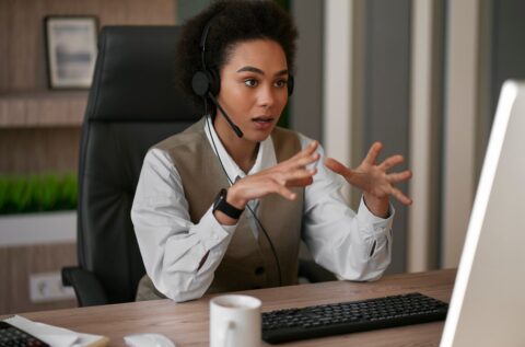 medium-shot-female-economist-working-office_23-2150251731