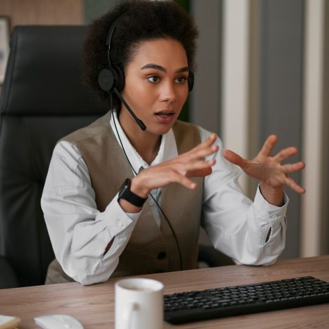 medium-shot-female-economist-working-office_23-2150251731