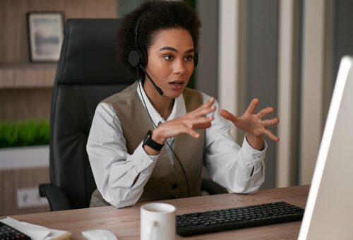 medium-shot-female-economist-working-office_23-2150251731